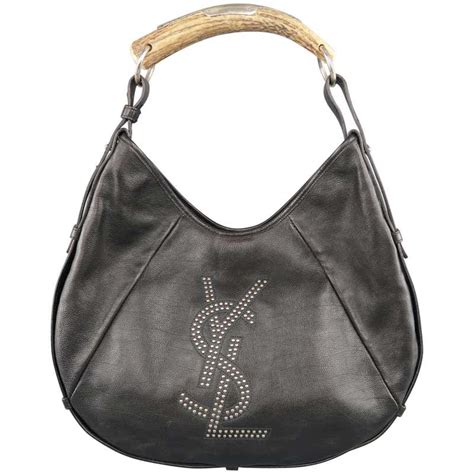 ysl star studded bucket bag|ysl black evening bag.